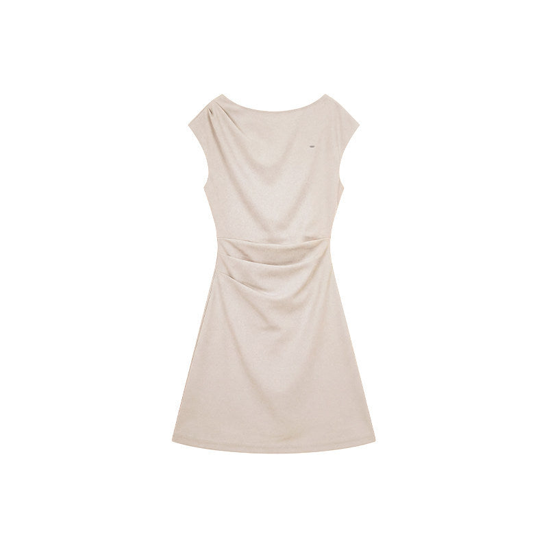 A-line cap sleeve ruched waist mini dress in soft stretch knit, styled with sandals for a warm day