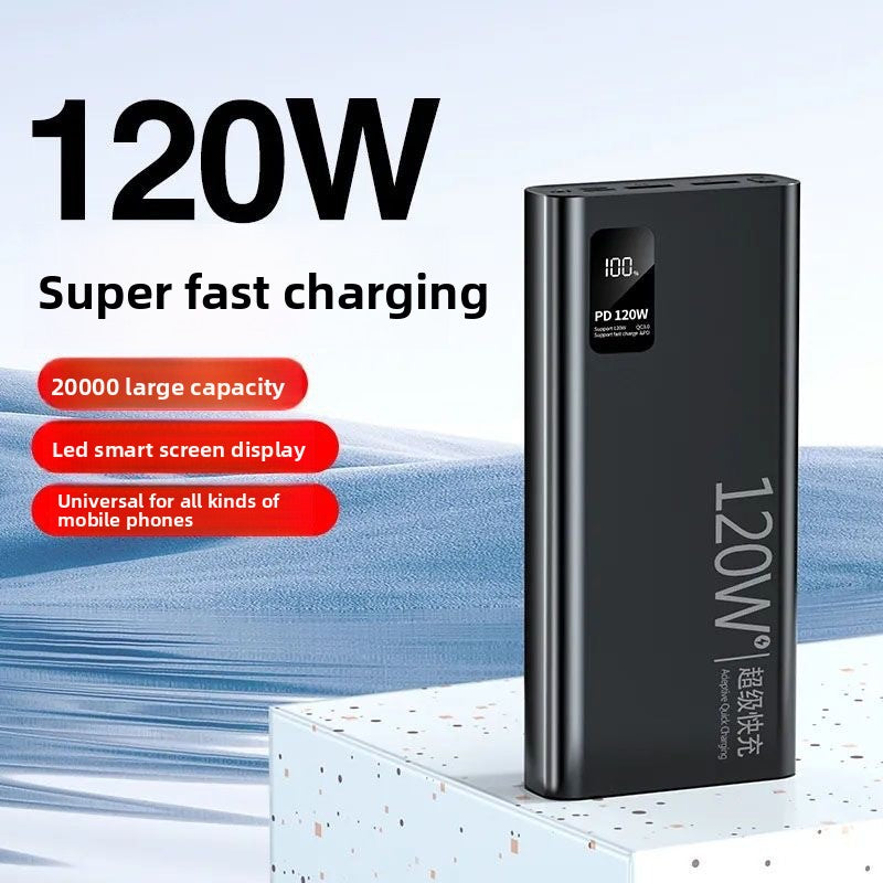 Black power bank photographed at an angle with the display window visible