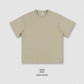 Close view of the thick 305g cotton knit and ribbed crew neckline on the oversized tee