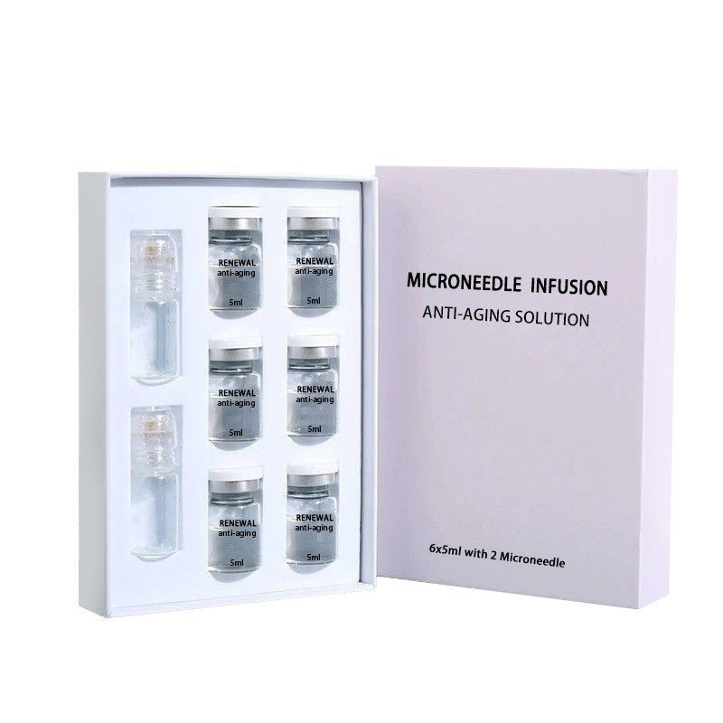 Microneedle serum kit with six 5 ml vials and two clear applicator caps in a white tray