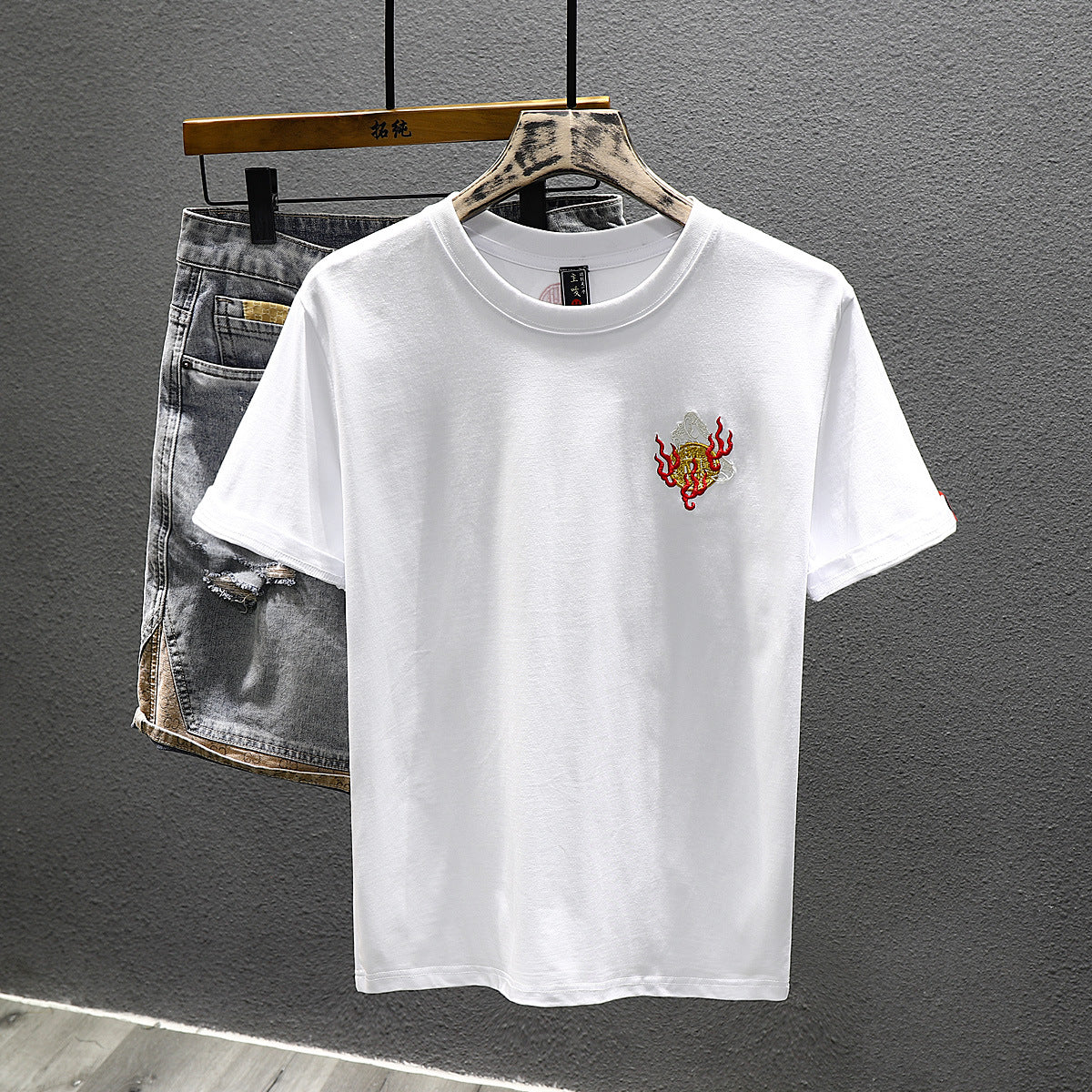 Cotton crew neck t-shirt shown in wear, draping cleanly through the shoulders