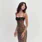 Leopard print midi dress with black lace bust panel and thin straps front view