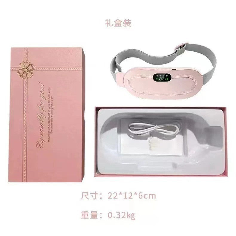 Pink gift box opened to show the pink heating belt and a coiled white USB charging cable