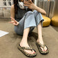 Thick sole EVA flip flops in leopard print worn with cropped jeans