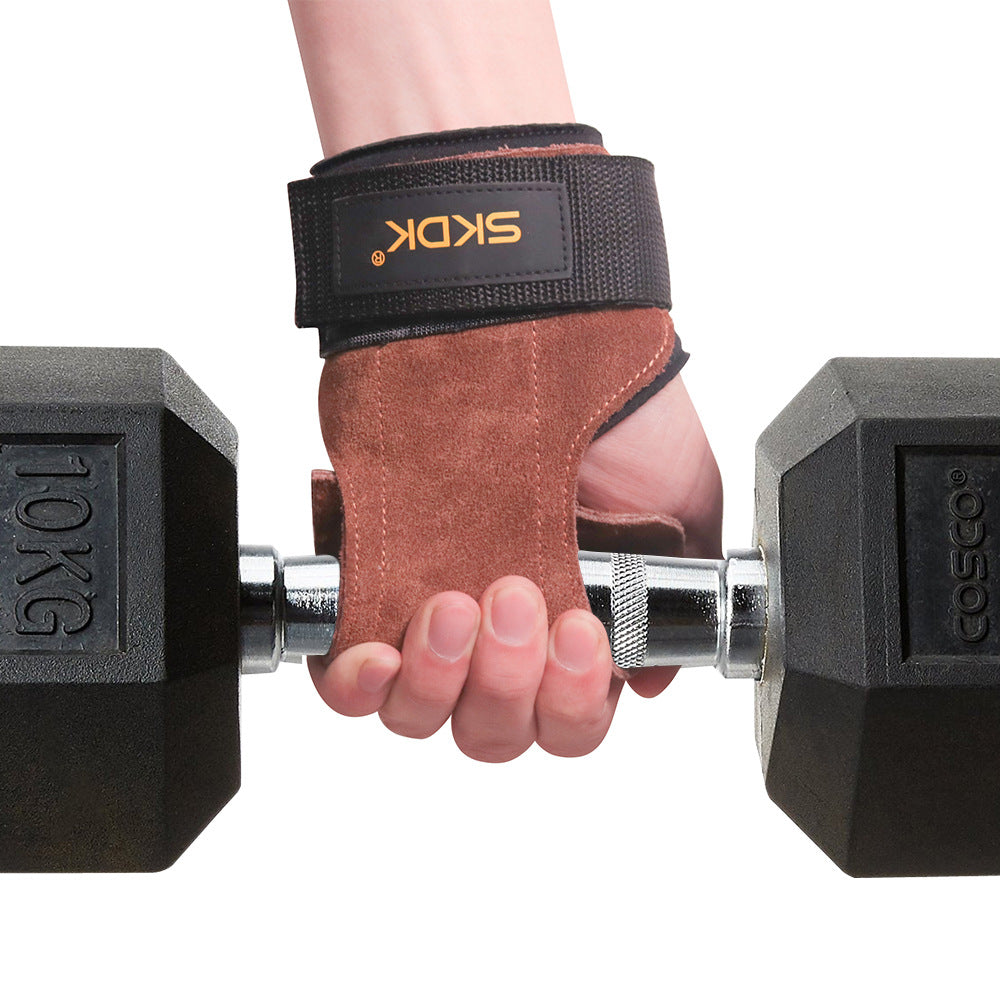 Brown leather gym palm grips with a padded wrist strap