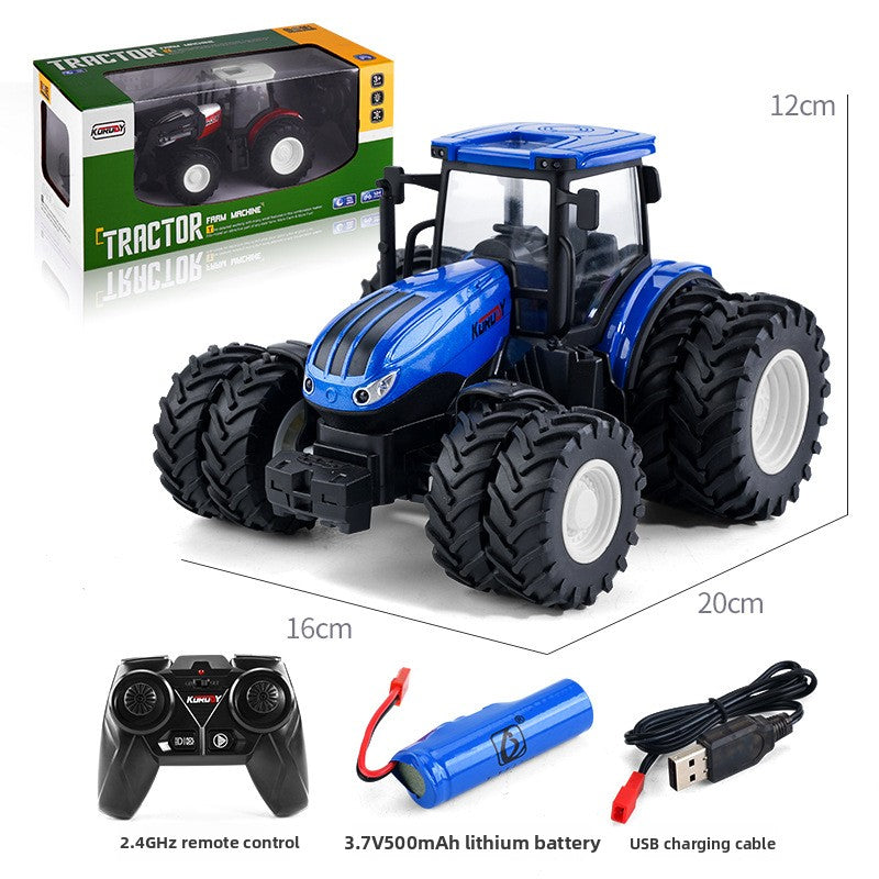 Remote control farm tractor toy with chunky red-rimmed tyres on a light backdrop