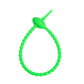 Soft silicone tadpole cable tie coiled into a loop to show the reusable cinch closure