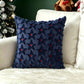 Plush carved cushion cover with a star motif carved into the short plush pile