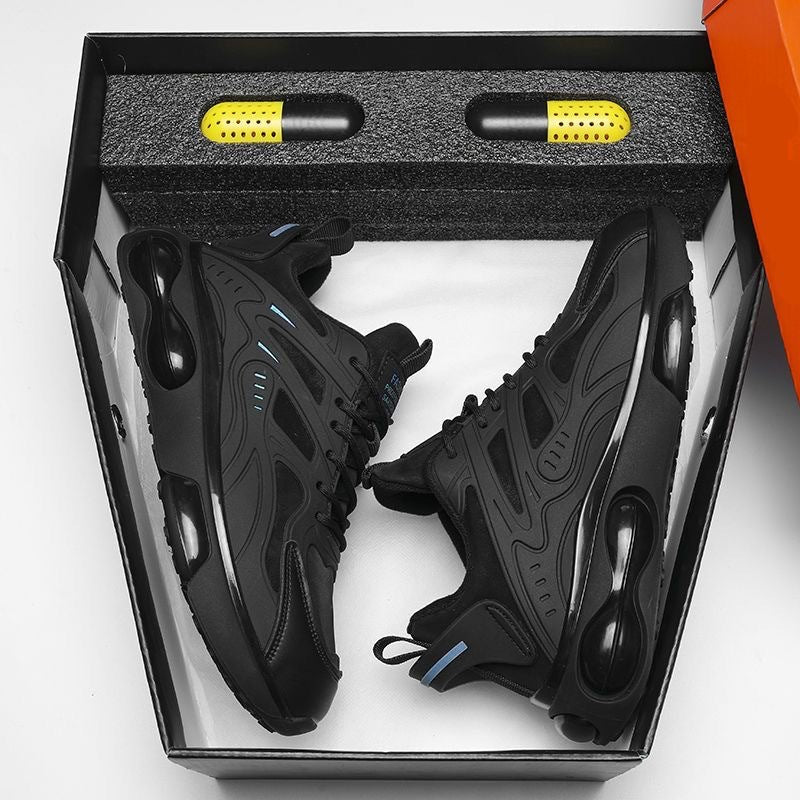 Black air cushion sneaker shown from the side to reveal the thick sole