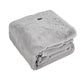 Folded gray plush heating shawl blanket with a round switch button near the top edge on a white background