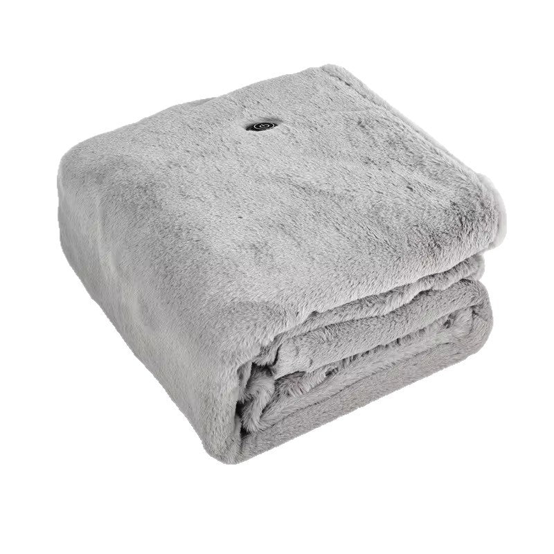 Folded gray plush heating shawl blanket with a round switch button near the top edge on a white background