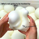 Japanese moldable slow-rebound squeeze bun toy, soft squishy fidget toy held in one hand