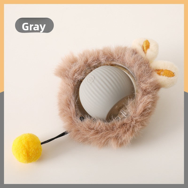 Grey rolling cat ball set in a brown plush ring with embroidered ears and a yellow pompom on a wire