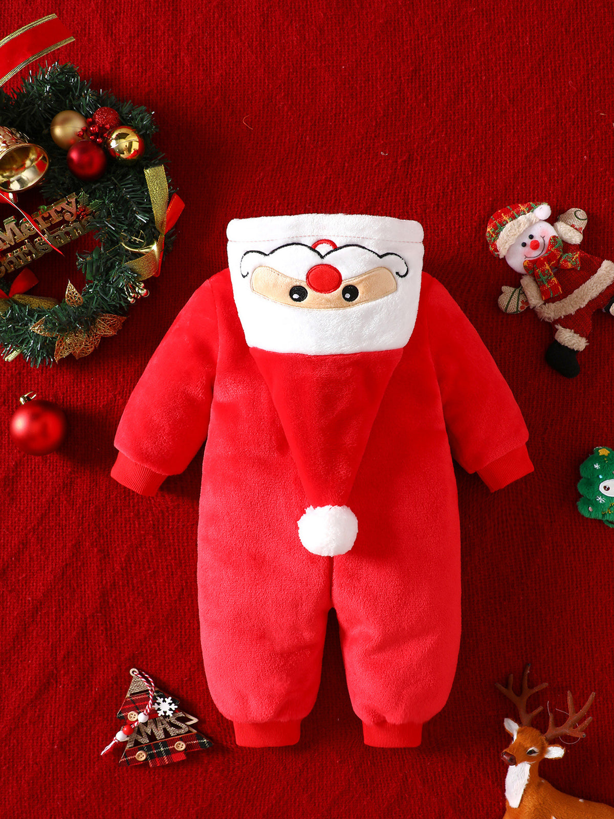 Back of the red fleece Santa baby jumpsuit showing the Santa hat tail with a white pompom