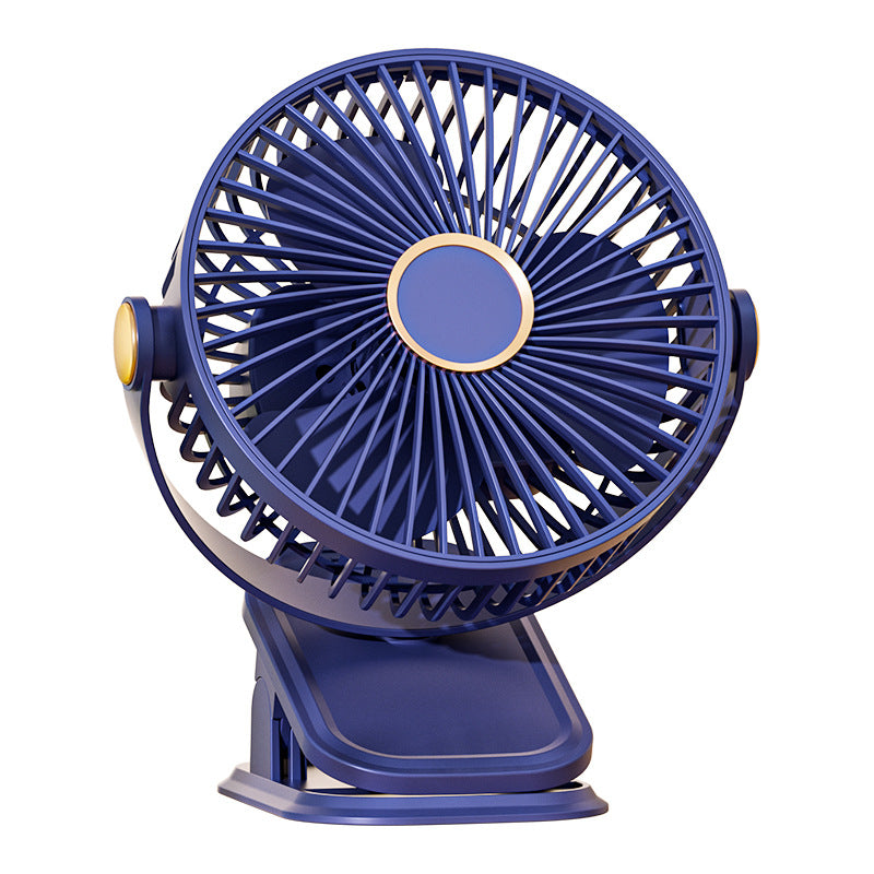 Blue clip fan on a plain background, three blades behind a round grille and gold hub ring