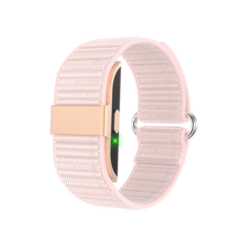 Pink woven nylon activity tracker band with rose gold keeper and D-rings