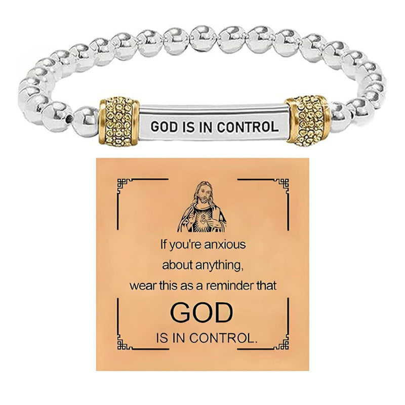 Silver bead bracelet with a God Is In Control engraved bar and gold pave rondelles