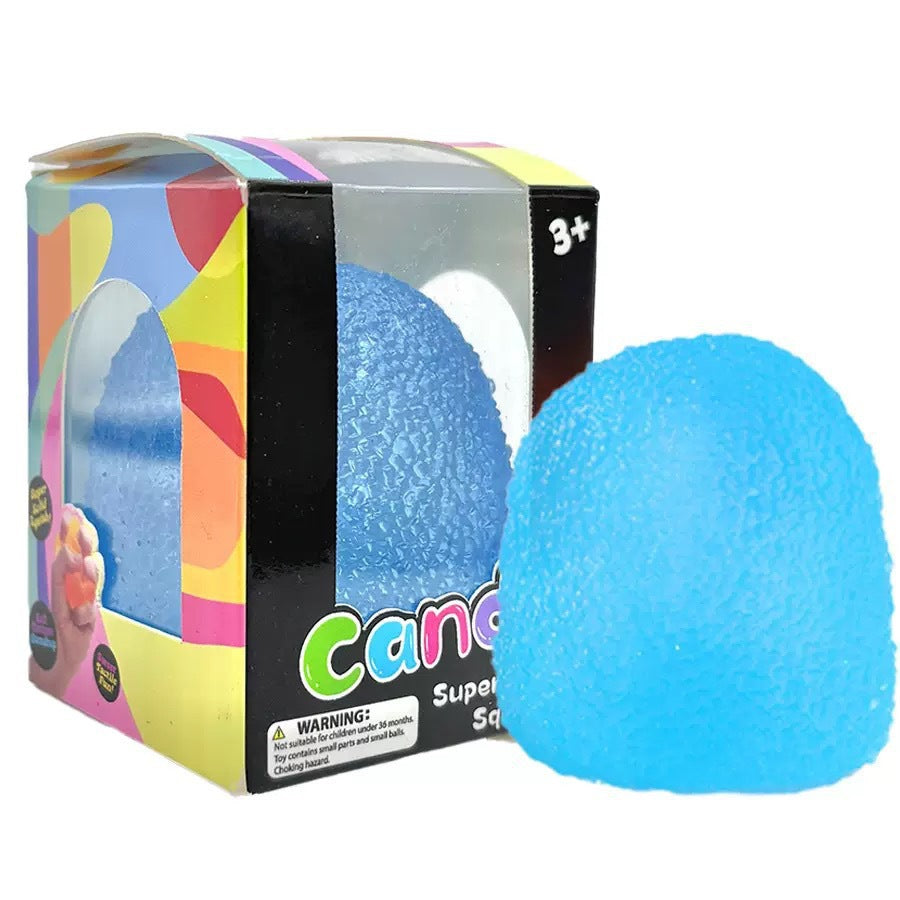 Blue candy dome squishy toy with a textured surface beside its printed 3+ box