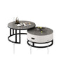 Cutout of two round nesting tables with a gray top, black frame, a white drawer cabinet and arrow callouts