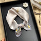 White minimal print printed square scarf with a satin sheen and hemmed edges, shown displayed and knotted