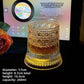 Cut glass tumbler on its lit coaster with the maker size panel, 7.7 cm and 260 ml