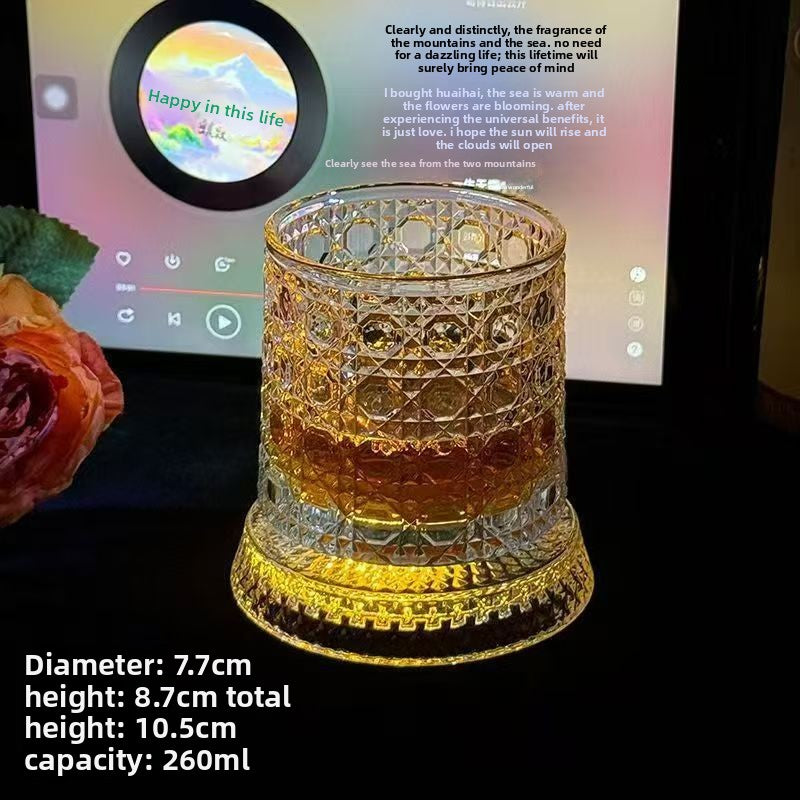 Cut glass tumbler on its lit coaster with the maker size panel, 7.7 cm and 260 ml