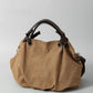 Canvas Tote Bag (Retro Brown) | scale reference with hand