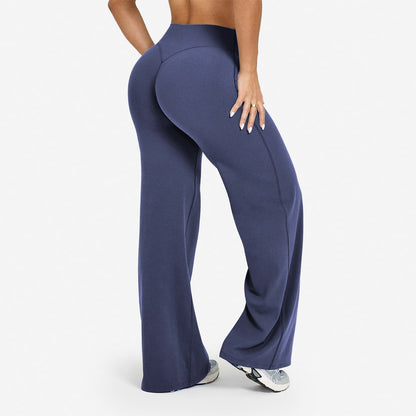 Womens high waisted wide leg stretch pants shown on a model