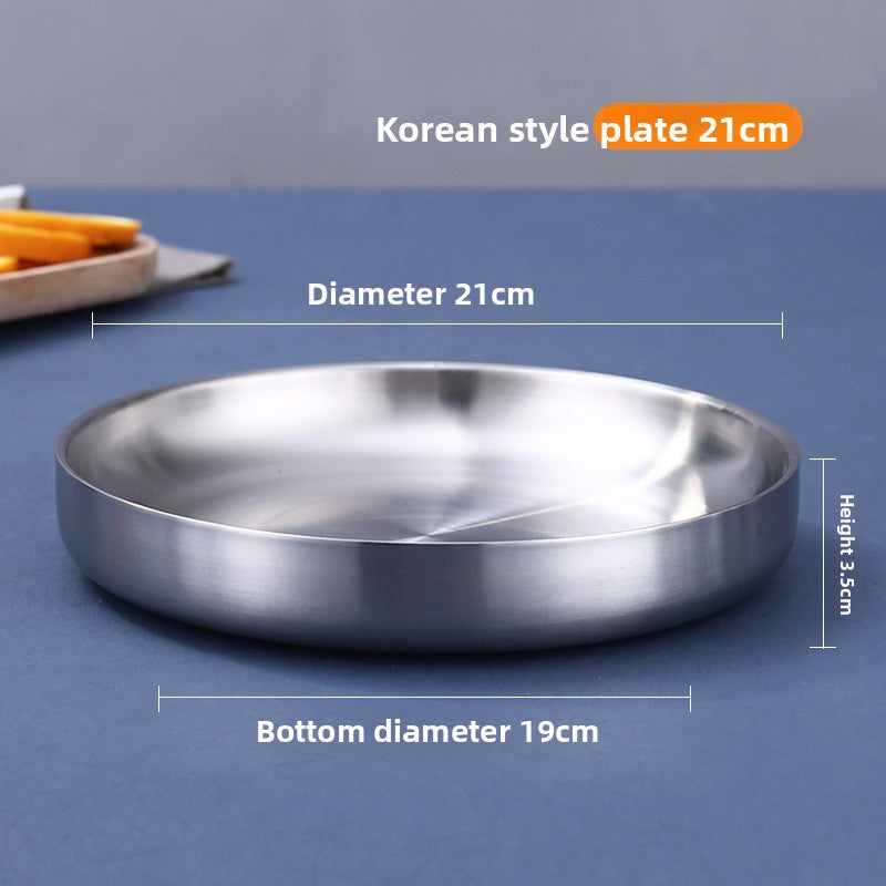 Brushed 304 stainless steel double wall plate and bowl set on a table