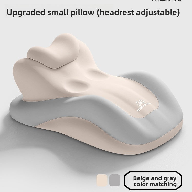 Beige and gray two tone lounge pillow showing the adjustable small headrest