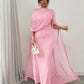 Pink chiffon cape sleeve long gown with cinched waist and floor length skirt, on model