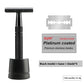 Matte black safety razor on a weighted stand shown with double edge replacement blades