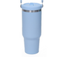 Light blue insulated tumbler with a stainless steel ring below the flip lid and a handle at the top