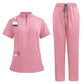 Badge reel clipped to the chest tab of the scrub top on a model
