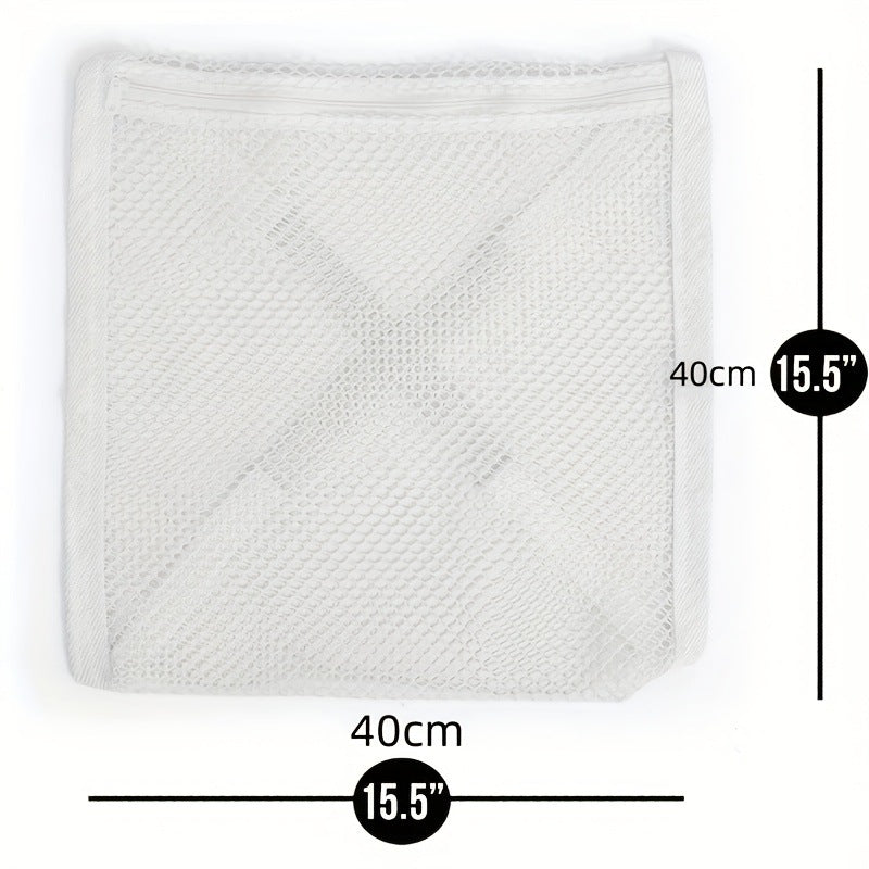 White wall mounted shoe drying bag holding shoes off the floor