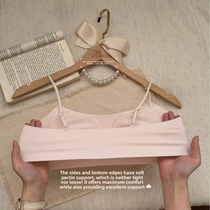 Seamless wireless bralette shown flat to display the smooth one piece body and thin straps