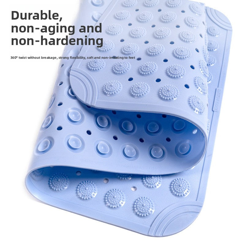 Flat view of the perforated PVC bath mat, concentric ridges on every raised dome