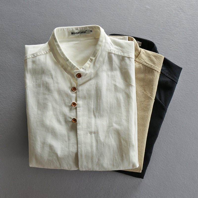 Stand collar linen shirt styled with denim for a relaxed everyday outfit