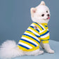 Plush fleece dog sweater with a ribbed collar and a small back D-ring, angled