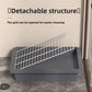 Dog potty tray wire grid with wide gaps that let waste fall through to the base