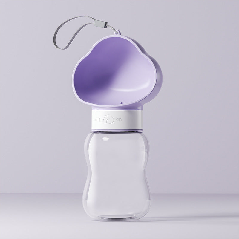 Purple cloud lid pet water bottle with white twist ring and open drinking trough on a lilac background