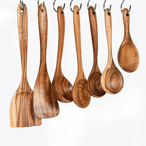 Teak wooden spatula and frying shovel showing grain detail