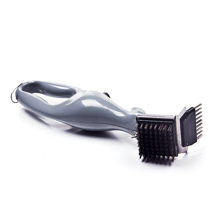 Grill cleaning brush showing looped ergonomic grey handle and steel bristle scraper head from the side