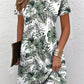 Digital floral print round neck dress with short sleeves shown front on a model