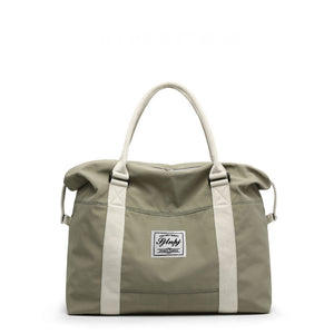 Sage green nylon weekender bag with cream top handles