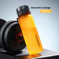 Orange sports water bottle labelled dynamic orange 800 ml beside a dumbbell