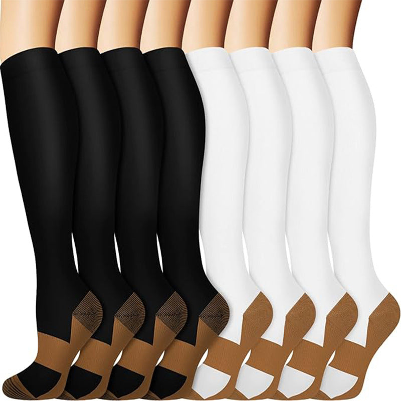 Assorted athletic compression socks in floral, animal and geometric prints
