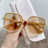 Creamy white frame tea tint lenses