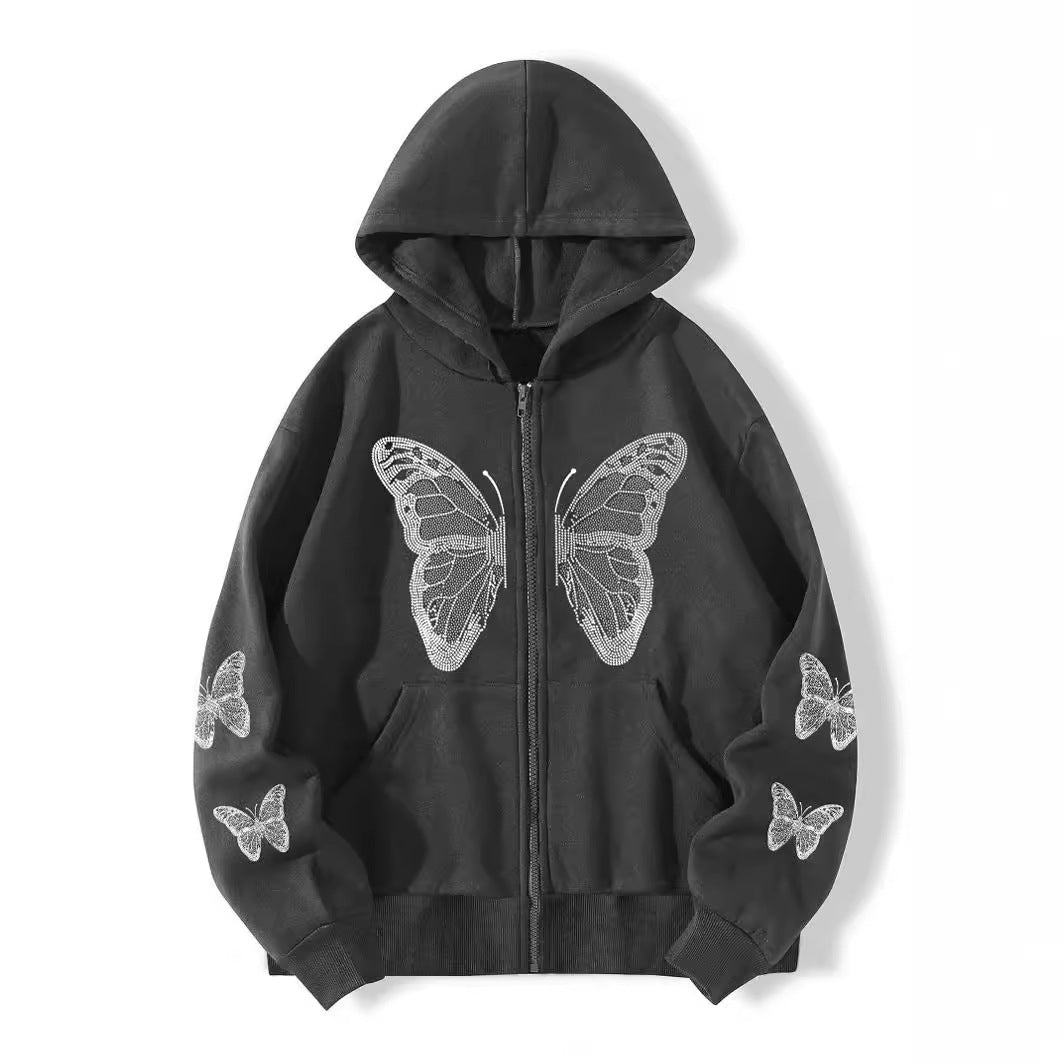 Side profile of the butterfly zip hoodie showing ribbed cuffs and sleeve rhinestones