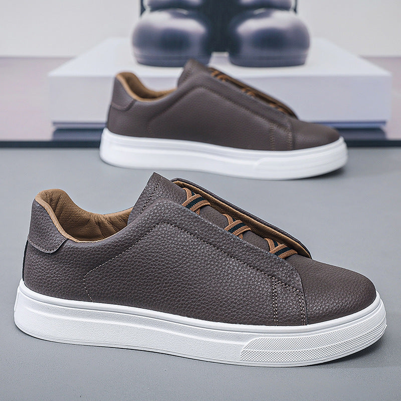 Brown pebbled vegan leather slip-on low-top sneakers with white sole, shown in a shade not listed as an option